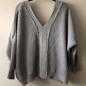 Gray knit slouchy sweater with cute tied back